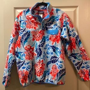 Patagonia jacket. Great for winter/skiing.